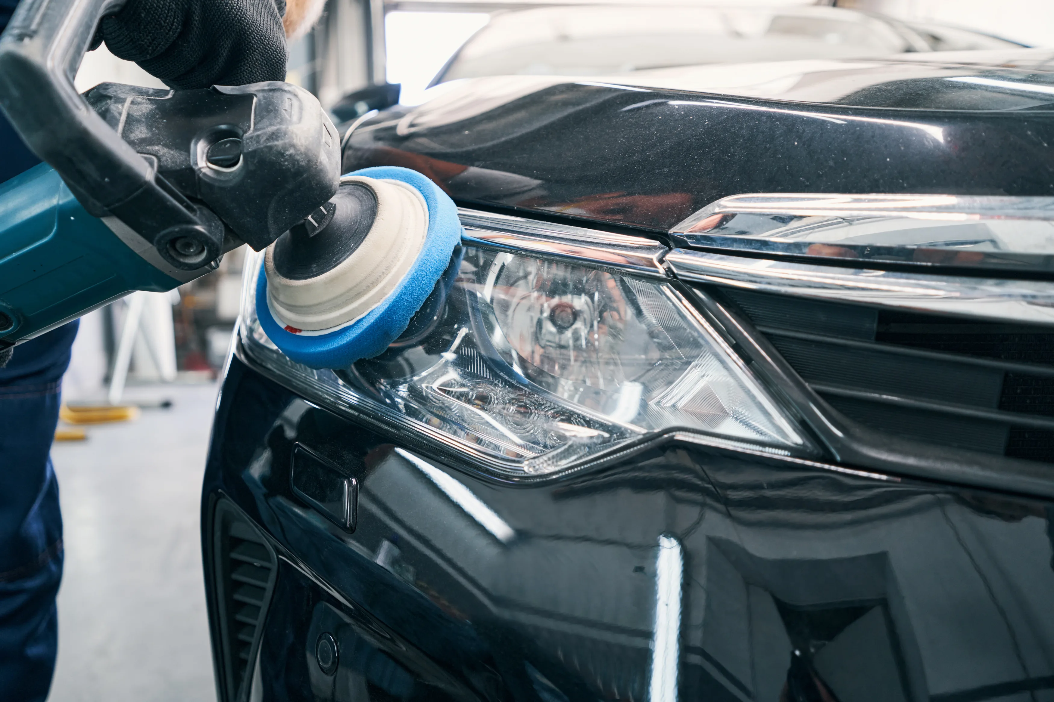 Restored automotive headlight lens with clarity